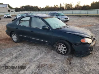 2000 Hyundai Elantra GLS z VIN KMHJF35F6YU890800, wystawiony jako Copart lot #76972294 z przebiegiem 159 134 mil mil oraz Szkoda całkowita • Salvage title. Historia ofert i sprzedaży dostępna na DreamBid. Obrazek 4.