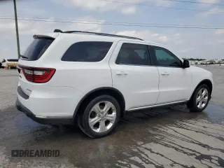 2014 Dodge Durango Limited with VIN 1C4RDHDG9EC551776, listed as a Copart auction lot 54954415 with 195,798 mi miles and Salvage title. Bid and sale history available at DreamBid. Image 3.