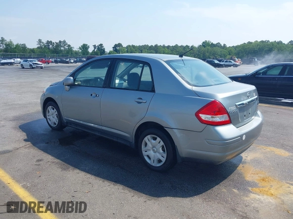 2011 Nissan Versa S with VIN 3N1BC1AP6BL391682, listed as a IAAI auction lot 42228389 with 219,572 mi miles and . Bid and sale history available at DreamBid. Image 3.