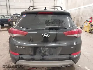 2018 Hyundai Tucson Value with VIN KM8J3CA28JU648236, listed as a IAAI auction lot 41161221 with 104,057 mi miles. Bid and sale history available at carsss.com. Image 17.