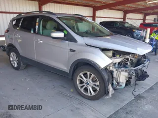 2018 Ford Escape SE with VIN 1FMCU0G90JUC63679, listed as a IAAI auction lot 41658115 with 154,106 mi miles. Bid and sale history available at carsss.com. Image 1.
