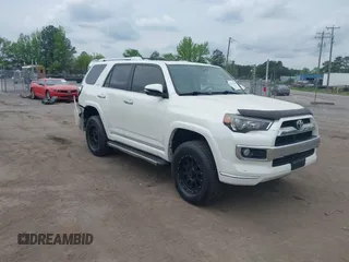 2014 Toyota 4Runner Limited with VIN JTEBU5JR4E5185764, listed as a IAAI auction lot 42117308 with 199,477 mi miles. Bid and sale history available at carsss.com. Image 1.