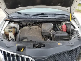 2015 Lincoln MKX z VIN 2LMDJ6JK7FBL23356, wystawiony jako Copart lot #56653295 z przebiegiem 101 982 mil mil oraz Szkoda całkowita • Salvage title. Historia ofert i sprzedaży dostępna na DreamBid. Obrazek 12.