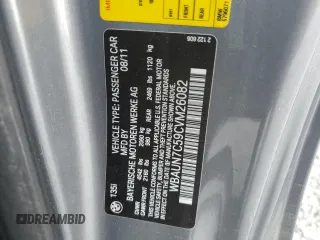 2012 BMW 1 Series 135i with VIN WBAUN7C59CVM26082, listed as a Copart auction lot 74711754 with 77,152 mi miles and Salvage title. Bid and sale history available at DreamBid. Image 13.