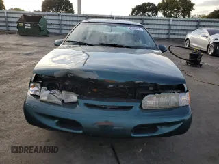 1994 Ford Thunderbird LX with VIN 1FALP62W6RH128762, listed as a Copart auction lot 84306604 with 68,314 mi miles and Salvage Title. Bid and sale history available at DreamBid. Image 5.