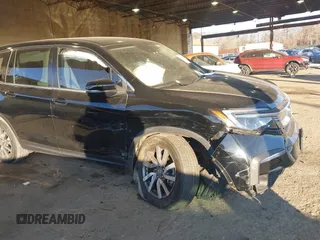 2022 Honda Pilot EX-L with VIN 5FNYF6H57NB035910, listed as a IAAI auction lot 41308742 with 43,059 mi miles. Bid and sale history available at carsss.com. Image 6.
