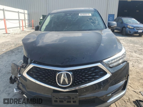 2021 Acura RDX w/Technology Package with VIN 5J8TC2H57ML023491, listed as a Copart auction lot 66988914 with 61,668 mi miles and Non Repairable. Bid and sale history available at carsss.com. Image 5.