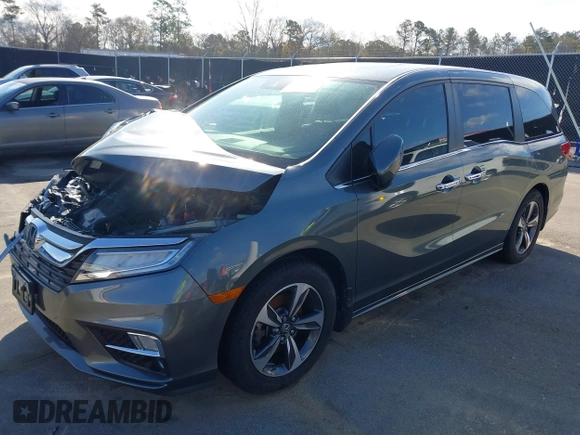 2020 Honda Odyssey Touring z VIN 5FNRL6H8XLB035047, wystawiony jako IAAI lot #41794343 z przebiegiem 57 537 mil mil oraz . Historia ofert i sprzedaży dostępna na DreamBid. Obrazek 17.
