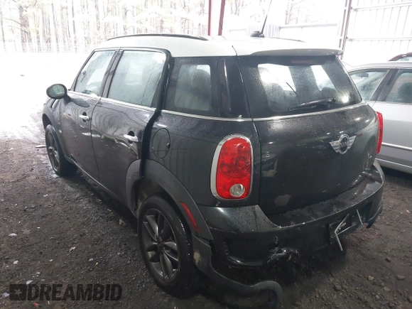 2014 MINI Countryman S with VIN WMWZC5C53EWP40677, listed as a IAAI auction lot 41473281 with 108,616 mi miles and . Bid and sale history available at DreamBid. Image 3.