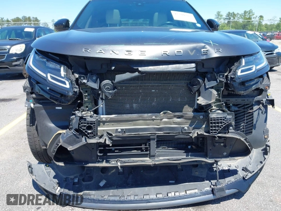 2020 Land Rover Range Rover Velar R-Dynamic S z VIN SALYK2EX5LA243809, wystawiony jako IAAI lot #42200383 z przebiegiem 66 381 mil mil oraz . Historia ofert i sprzedaży dostępna na DreamBid. Obrazek 6.