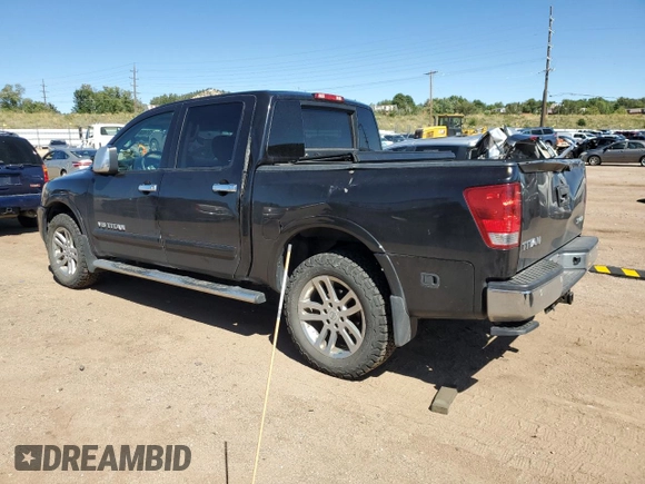 2014 Nissan Titan Pro-4X with VIN 1N6AA0EC2EN519983, listed as a Copart auction lot 71496934 with 150,259 mi miles and Salvage title. Bid and sale history available at DreamBid. Image 2.