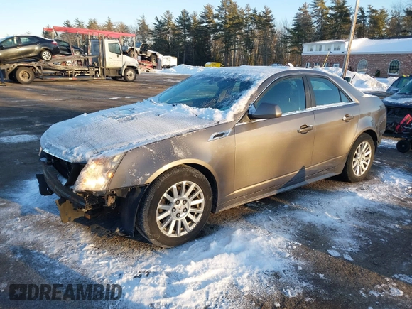 2012 Cadillac CTS Luxury with VIN 1G6DH5E53C0135315, listed as a IAAI auction lot 41272590 with 105,419 mi miles and . Bid and sale history available at DreamBid. Image 2.