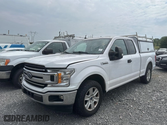 2019 Ford F-150 XL z VIN 1FTEX1C48KKE41467, wystawiony jako IAAI lot #42518514 z przebiegiem 107 651 mil mil oraz . Historia ofert i sprzedaży dostępna na DreamBid. Obrazek 22.