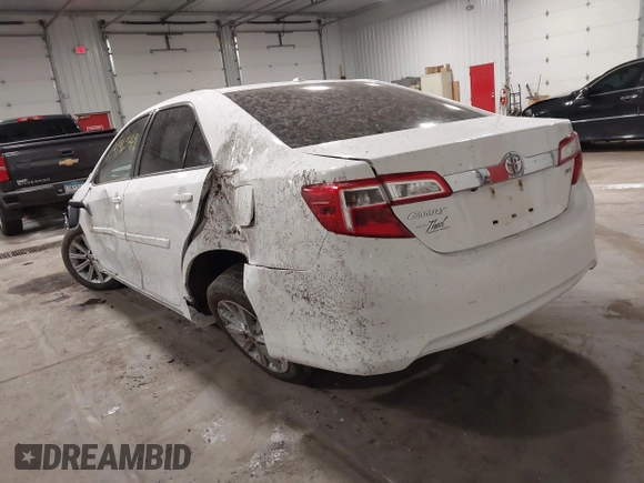2014 Toyota Camry L with VIN 4T1BF1FK4EU734657, listed as a IAAI auction lot 41963449 with 167,826 mi miles. Bid and sale history available at carsss.com. Image 3.