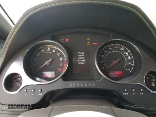 2013 Lamborghini Gallardo z VIN ZHWGU6BZ9DLA12793, wystawiony jako Copart lot #77525804 z przebiegiem 11 777 mil mil oraz Szkody całkowita. Historia ofert i sprzedaży dostępna na DreamBid. Obrazek 9.