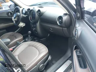 2015 MINI Countryman S z VIN WMWZC3C57FWT06297, wystawiony jako IAAI lot #41988157 z przebiegiem 74 461 mil mil oraz . Historia ofert i sprzedaży dostępna na DreamBid. Obrazek 5.