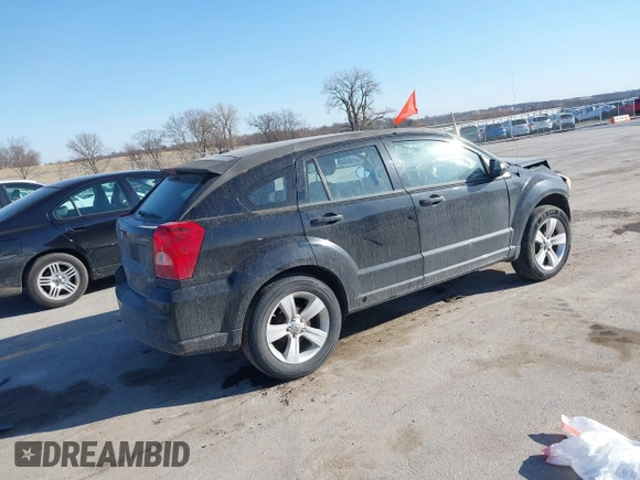 2010 Dodge Caliber SXT with VIN 1B3CB4HA4AD651946, listed as a IAAI auction lot 41771139 with 165,663 mi miles and . Bid and sale history available at DreamBid. Image 4.