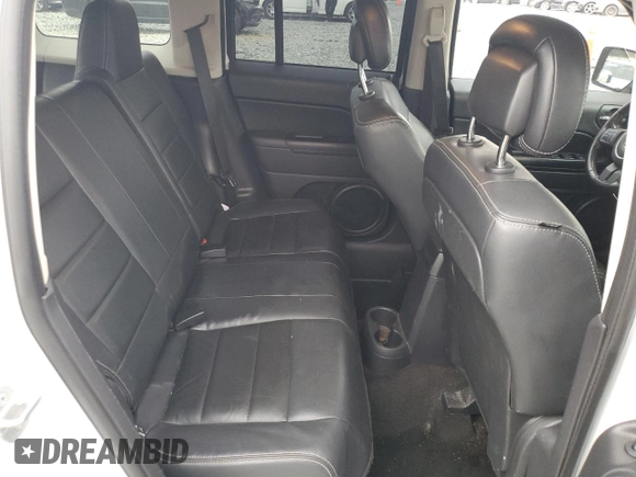 2014 Jeep Patriot Latitude z VIN 1C4NJPFA2ED928050, wystawiony jako Copart lot #50195295 z przebiegiem 130 437 mil mil oraz Szkoda całkowita • Salvage title. Historia ofert i sprzedaży dostępna na DreamBid. Obrazek 11.