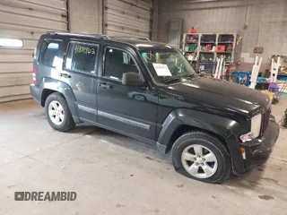 2009 Jeep Liberty Sport with VIN 1J8GN28K79W547903, listed as a IAAI auction lot 41889962 with 127,821 mi miles. Bid and sale history available at carsss.com. Image 1.