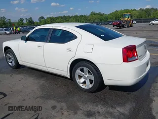 2009 Dodge Charger SE with VIN 2B3KA43V59H523089, listed as a IAAI auction lot 42002447 with 265,731 mi miles. Bid and sale history available at carsss.com. Image 3.