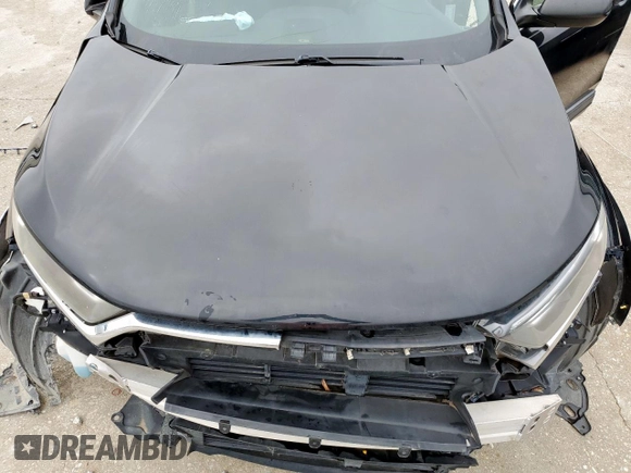 2019 Honda CR-V LX with VIN 2HKRW5H31KH412953, listed as a Copart auction lot 53327565 with 106,865 mi miles and Clean Title. Bid and sale history available at carsss.com. Image 12.