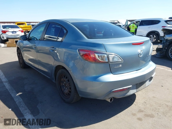 2010 Mazda Mazda3 i Touring with VIN JM1BL1SG5A1164355, listed as a IAAI auction lot 42044865 with 127,809 mi miles. Bid and sale history available at carsss.com. Image 3.