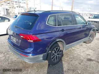 2021 Volkswagen Tiguan SE with VIN 3VV3B7AX9MM051125, listed as a IAAI auction lot 41527014 with 68,847 mi miles. Bid and sale history available at carsss.com. Image 4.