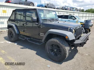 2015 Jeep Wrangler Unlimited Sport with VIN 1C4BJWDG1FL668395, listed as a Copart auction lot 64035035 with 79,972 mi miles and Salvage title. Bid and sale history available at DreamBid. Image 4.