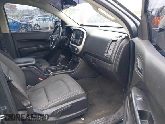 2015 GMC Canyon 4WD SLE with VIN 1GTG6BE3XF1153421, listed as a IAAI auction lot 42079375 with 161,379 mi miles and . Bid and sale history available at carsss.com. Image 5.