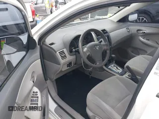 2010 Toyota Corolla with VIN 2T1BU4EE0AC359882, listed as a IAAI auction lot 42051633 with 227,481 mi miles. Bid and sale history available at carsss.com. Image 5.