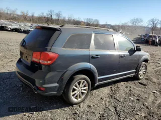 2013 Dodge Journey SXT with VIN 3C4PDDBG7DT505871, listed as a Copart auction lot 54657255 with 118,395 mi miles and Non Repairable. Bid and sale history available at DreamBid. Image 3.