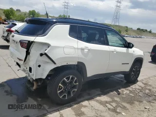 2020 Jeep Compass Trailhawk with VIN 3C4NJDDB1LT189240, listed as a Copart auction lot 57876235 with 70,309 mi miles and Salvage title. Bid and sale history available at DreamBid. Image 3.