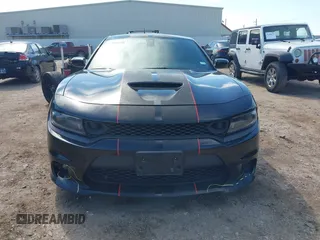 2019 Dodge Charger R/T with VIN 2C3CDXCT2KH575297, listed as a IAAI auction lot 41661339 with 119,854 mi miles and . Bid and sale history available at DreamBid. Image 12.