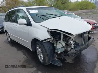 2005 Toyota Sienna XLE z VIN 5TDZA22C15S290471, wystawiony jako IAAI lot #42028879 z przebiegiem 298 992 mil mil oraz . Historia ofert i sprzedaży dostępna na DreamBid. Obrazek 1.