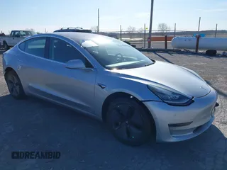 2018 Tesla Model 3 Long Range Battery with VIN 5YJ3E1EB9JF065057, listed as a IAAI auction lot 41863903 with 54,584 mi miles and . Bid and sale history available at DreamBid. Image 1.
