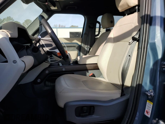 2023 Land Rover Defender SE with VIN SALEPEEU8P2115950, listed as a Copart auction lot 82717694 with 18,246 mi miles and Salvage title. Bid and sale history available at DreamBid. Image 7.