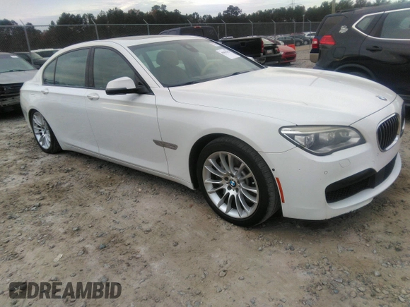2015 BMW 7 Series 750Li with VIN WBAYE8C50FD781160, listed as a IAAI auction lot 41061232 with 154,496 mi miles. Bid and sale history available at carsss.com. Image 1.