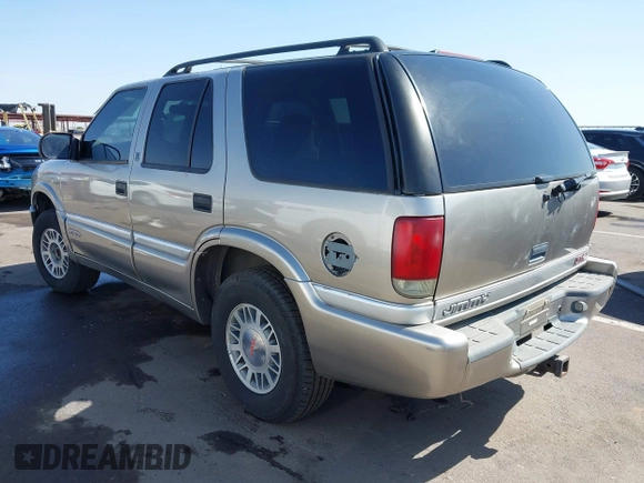 1999 GMC Jimmy SLE with VIN 1GKDT13W5X2539067, listed as a IAAI auction lot 41979222 with 1 mi miles. Bid and sale history available at carsss.com. Image 3.