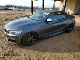 2016 BMW 2 Series M235i with VIN WBA1M1C53GV394612, listed as a Copart auction lot 42527815 with 60,630 mi miles and Salvage Title. Bid and sale history available at carsss.com. Image 1.