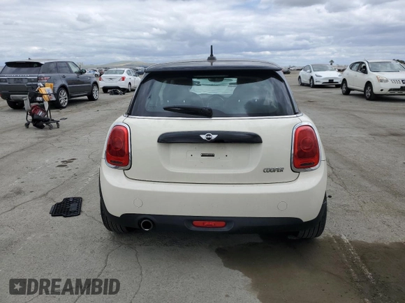 2016 MINI Hardtop with VIN WMWXP5C52G2D13922, listed as a Copart auction lot 54707815 with 47,625 mi miles and Salvage title. Bid and sale history available at DreamBid. Image 6.