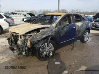 2024 Cadillac XT5 Platinum AWD with VIN 1GYKNFRS5RZ710824, listed as a Copart auction lot 52344485 with Not provided miles and Non repairable. Bid and sale history available at DreamBid. Image 1.