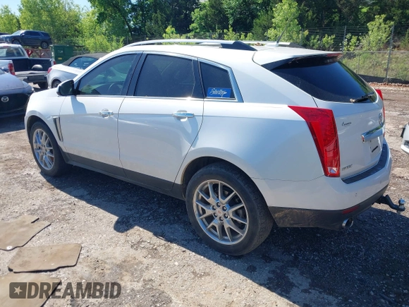 2013 Cadillac SRX Premium Collection with VIN 3GYFNEE33DS554556, listed as a IAAI auction lot 42152972 with 144,668 mi miles and . Bid and sale history available at DreamBid. Image 3.