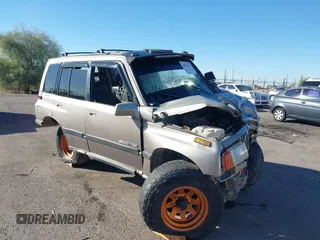 1995 Suzuki Sidekick JX z VIN 2S3TD03V3S6406536, wystawiony jako IAAI lot #40878592 z przebiegiem 253 055 mil mil oraz . Historia ofert i sprzedaży dostępna na DreamBid. Obrazek 1.