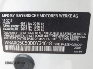 2013 BMW 5 Series 528i with VIN WBAXG5C50DDY34618, listed as a IAAI auction lot 42018050 with 85,272 mi miles and . Bid and sale history available at carsss.com. Image 9.