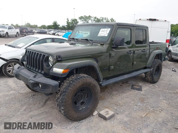 2022 Jeep Gladiator Texas Trail z VIN 1C6HJTAG1NL105124, wystawiony jako IAAI lot #42601707 z przebiegiem 52 064 mil mil oraz . Historia ofert i sprzedaży dostępna na DreamBid. Obrazek 17.