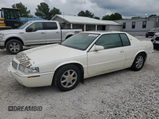2000 Cadillac Eldorado Touring with VIN 1G6ET1298YB702875, listed as a Copart auction lot 54434255 with 135,282 mi miles and Salvage Title. Bid and sale history available at DreamBid. Image 1.