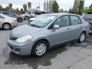 2011 Nissan Versa 1.8 S with VIN 3N1BC1AP0BL461824, listed as a IAAI auction lot 42076994 with 180,798 mi miles. Bid and sale history available at carsss.com. Image 2.