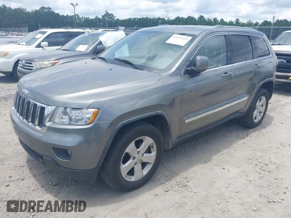 2011 Jeep Grand Cherokee Laredo with VIN 1J4RR4GG3BC595896, listed as a IAAI auction lot 42632333 with 135,426 mi miles and . Bid and sale history available at DreamBid. Image 2.