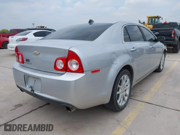 2012 Chevrolet Malibu LTZ with VIN 1G1ZG5E72CF313664, listed as a IAAI auction lot 42055669 with 97,053 mi miles and . Bid and sale history available at DreamBid. Image 4.