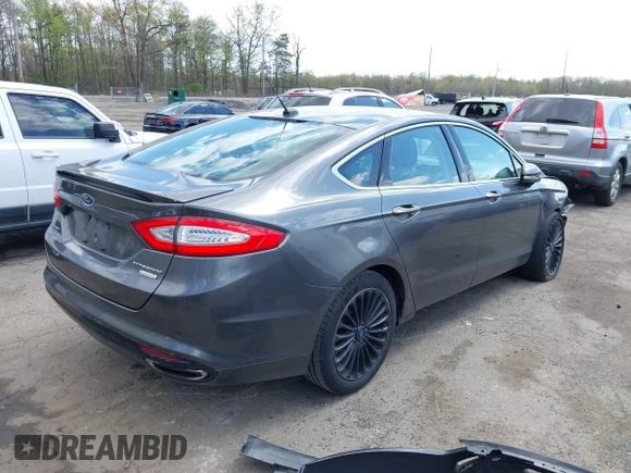 2015 Ford Fusion Titanium with VIN 3FA6P0K96FR283763, listed as a IAAI auction lot 42046868 with 104,542 mi miles. Bid and sale history available at carsss.com. Image 4.